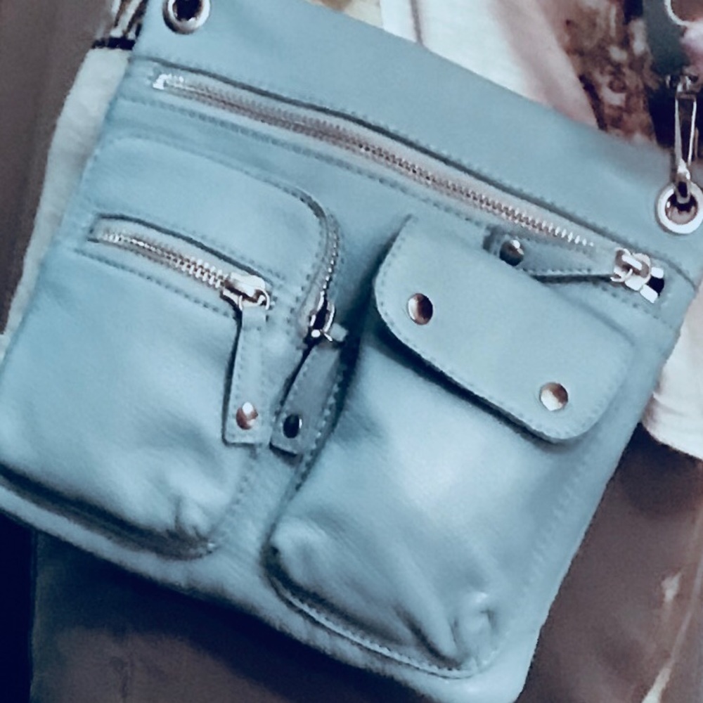 LOVE THIS BAG. Never found perfect matching outfit
